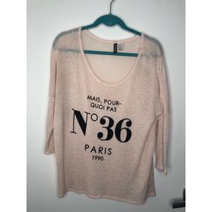 Blush knit sweater top with French writing